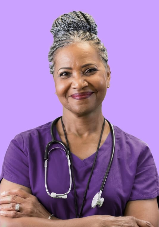 Jeenie-Homepage-happy black nurse purple scrubs